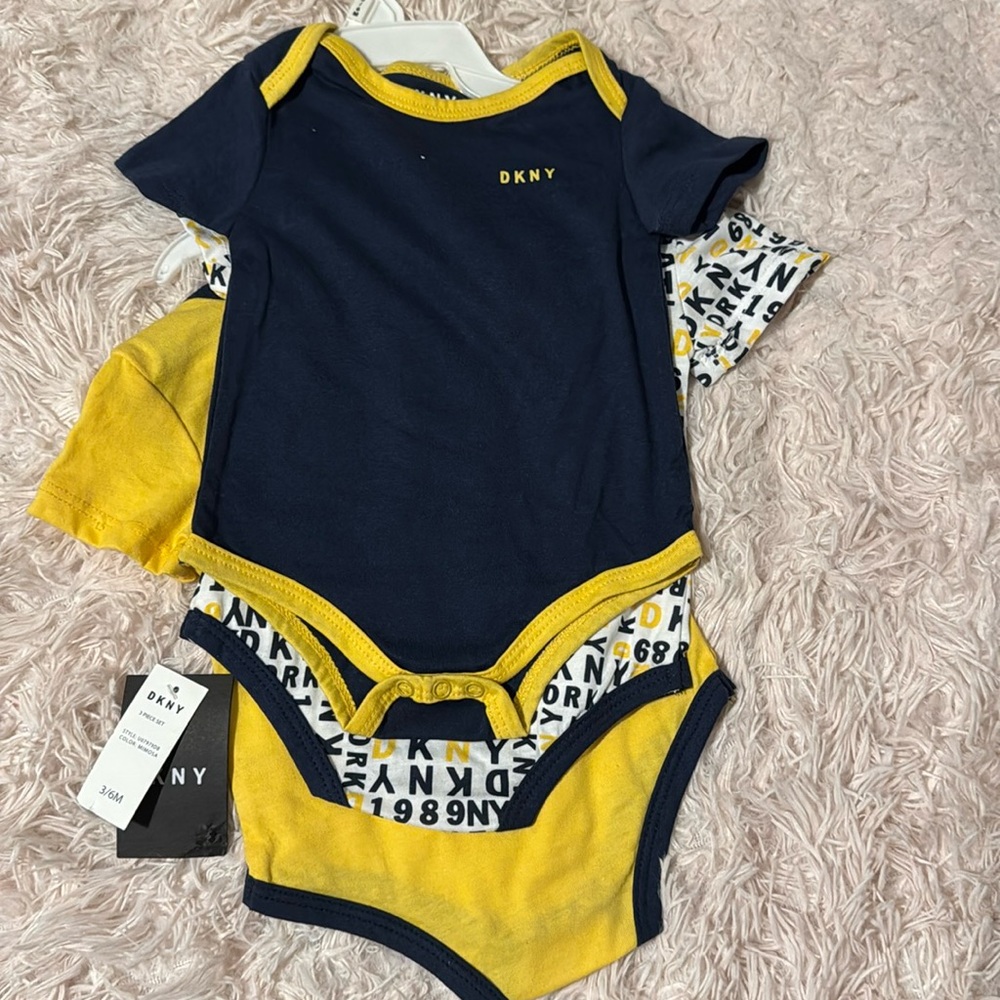 NWT DKNY baby 3-6 months onesie 3 pack.